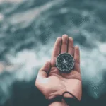 compass in hand