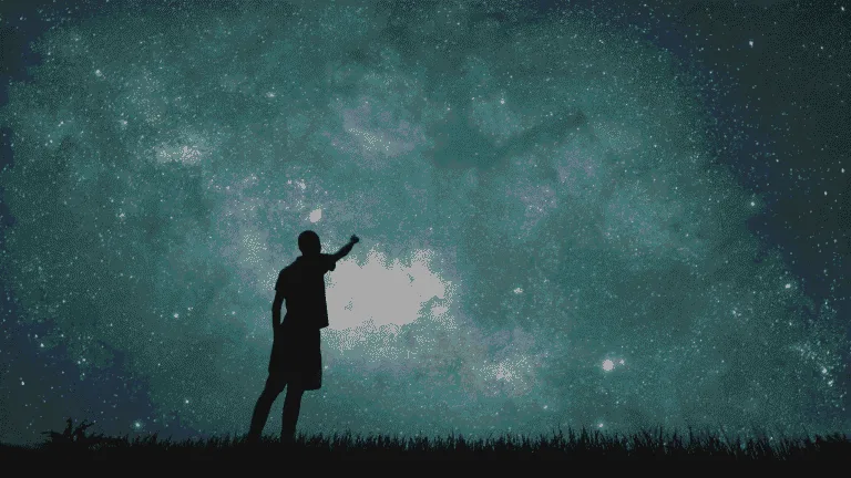 man looking at stars